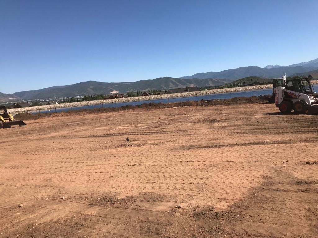 Graded building pad with mountain backdrop