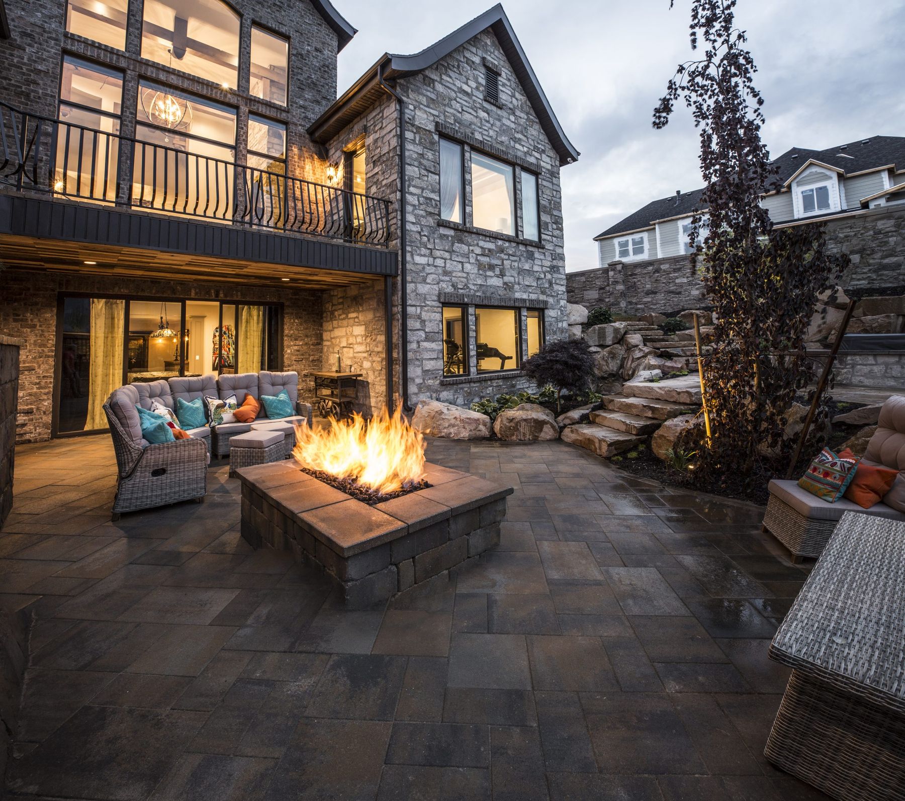 Paver patio and fire feature at a mountain residence