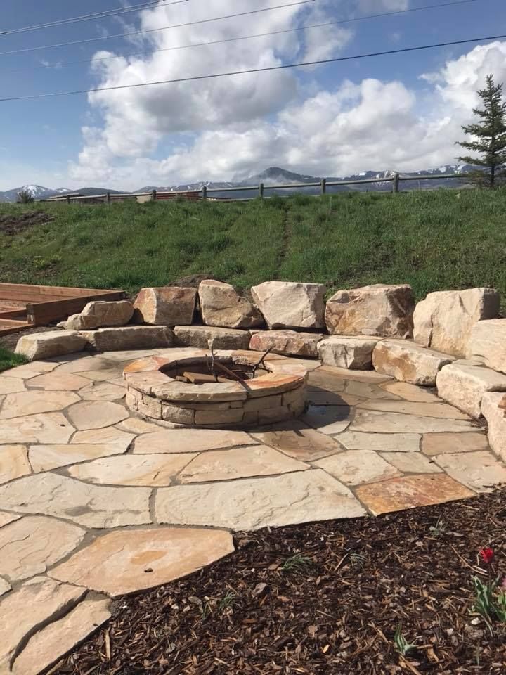 Circular flagstone fire pit surround